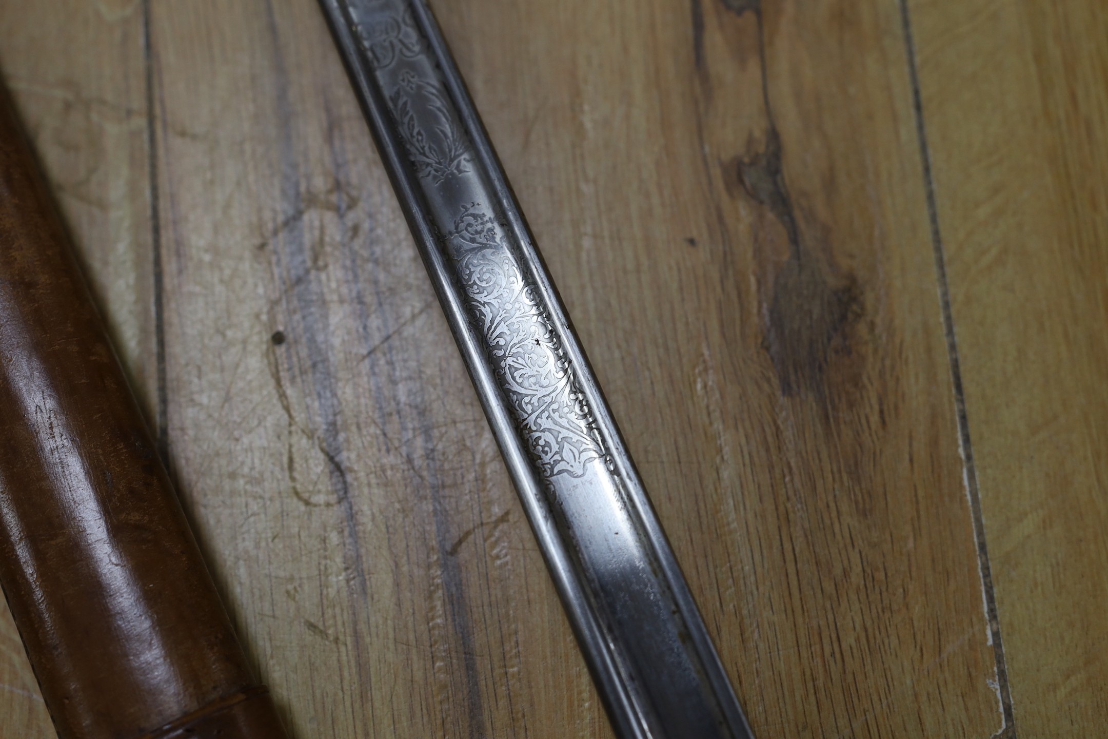 A Wilkinson George V officer's dress sword, stamped 1930 with broad arrow